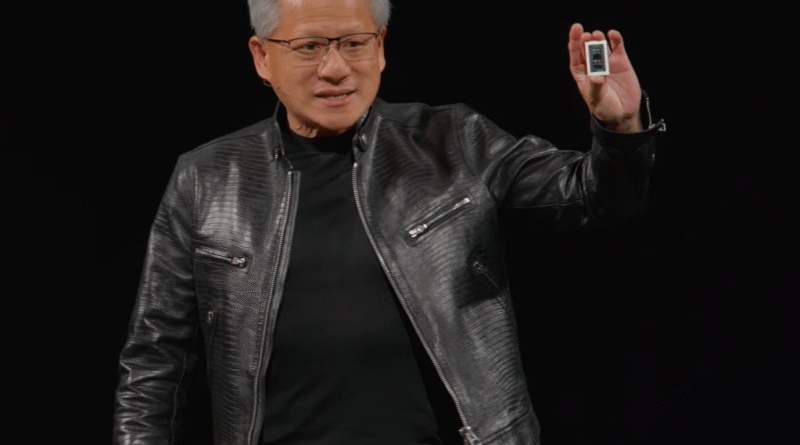 Nvidia Jensen Huang holds up RTX Spark chip
