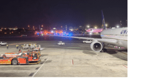 A photo that purports to show Flight UA236, grounded on the Tarmac, shot by Redditor louie08000.