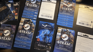 Steam gift cards on a table