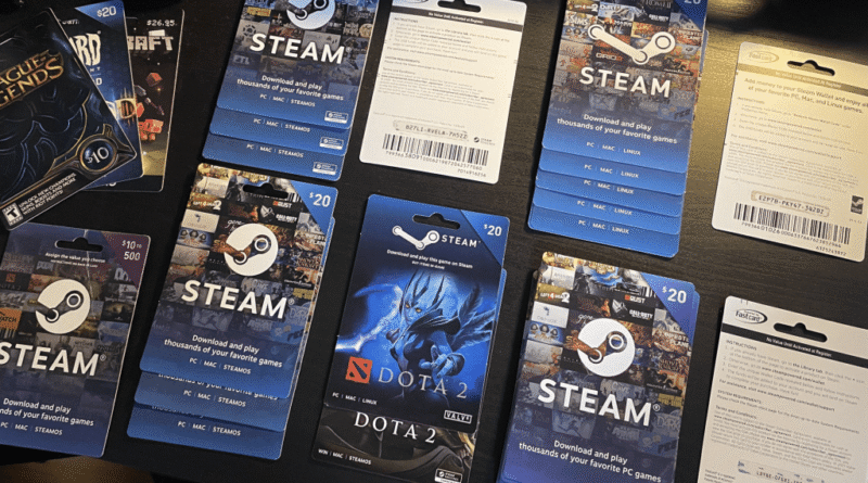Steam gift cards on a table