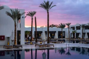 Hotel resort with white buildings during sunset
