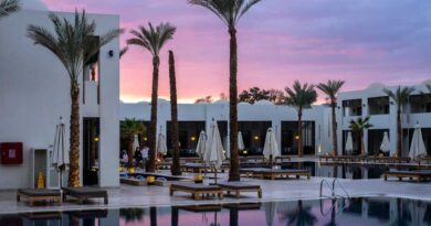 Hotel resort with white buildings during sunset