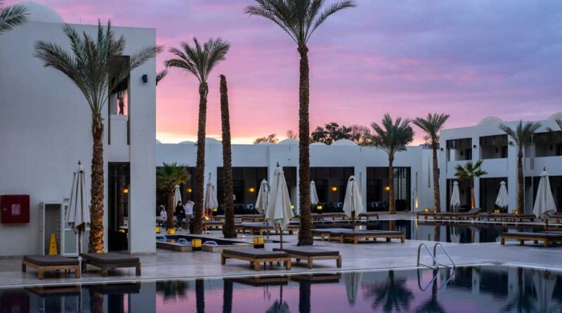 Hotel resort with white buildings during sunset