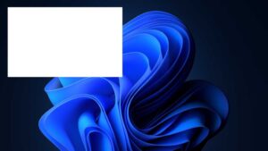 Windows 11 dark background with a white rectangular window in the corner