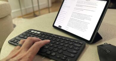 Claude Code on a table with a keyboard