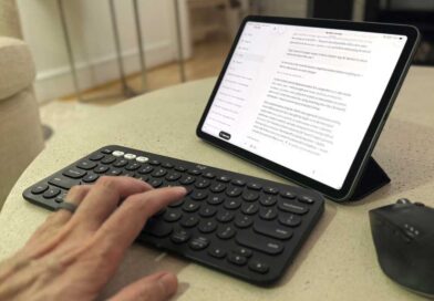 Claude Code on a table with a keyboard