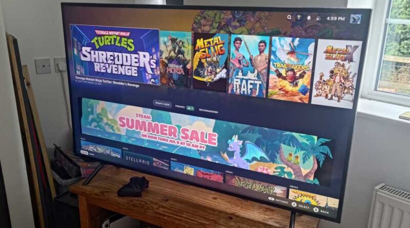 DIY Steam Machine running on a large TV on a wooden stand