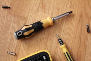 Magnetic screwdriver set on a wood floor