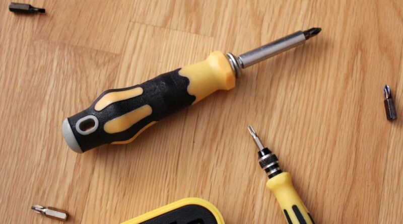 Magnetic screwdriver set on a wood floor