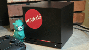Steam Machine with PCWorld sticker and Godzilla figure