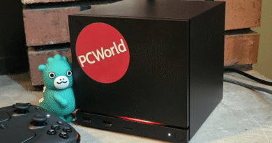 Steam Machine with PCWorld sticker and Godzilla figure