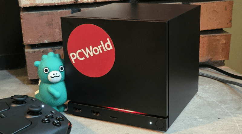 Steam Machine with PCWorld sticker and Godzilla figure