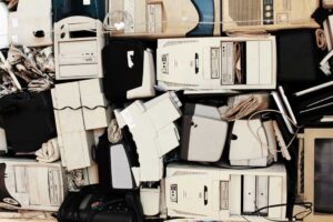 A collection of old, obsolete computers with beige cases