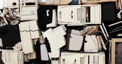 A collection of old, obsolete computers with beige cases