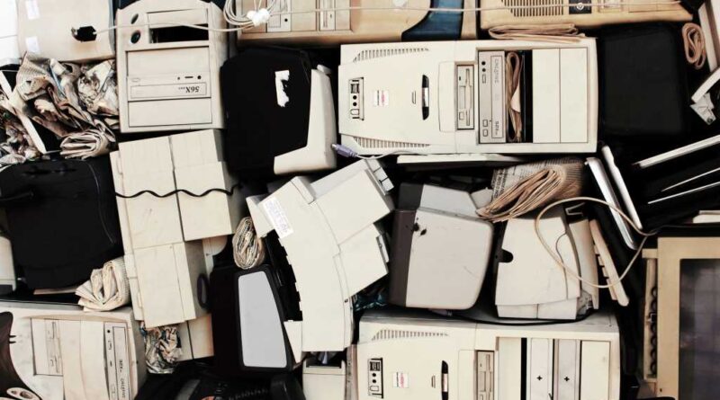 A collection of old, obsolete computers with beige cases