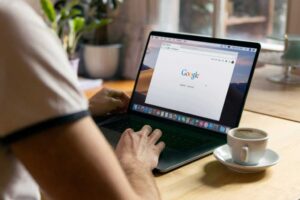 Google search page open on MacBook laptop