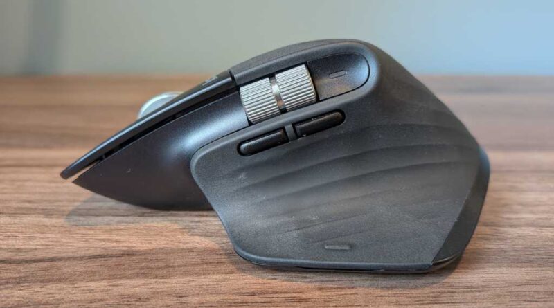 Side view of a Logitech MX Master 3S with two buttons and a scroll wheel.
