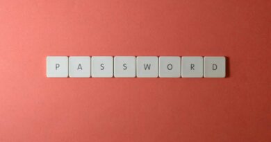 The word "password" spelled out in tiles on a pink background