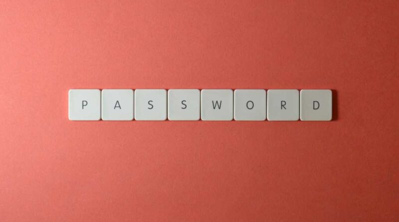 The word "password" spelled out in tiles on a pink background