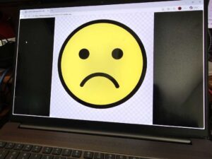 Frowny face laptop