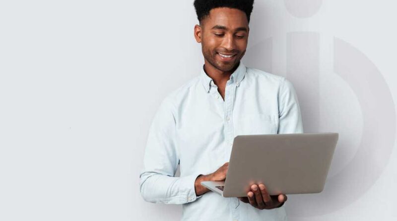 iolo guy holding laptop with grey iolo