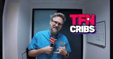 TFN Cribs logo superimposed over Adam Patrick Murray standing in the studio holding a microphone